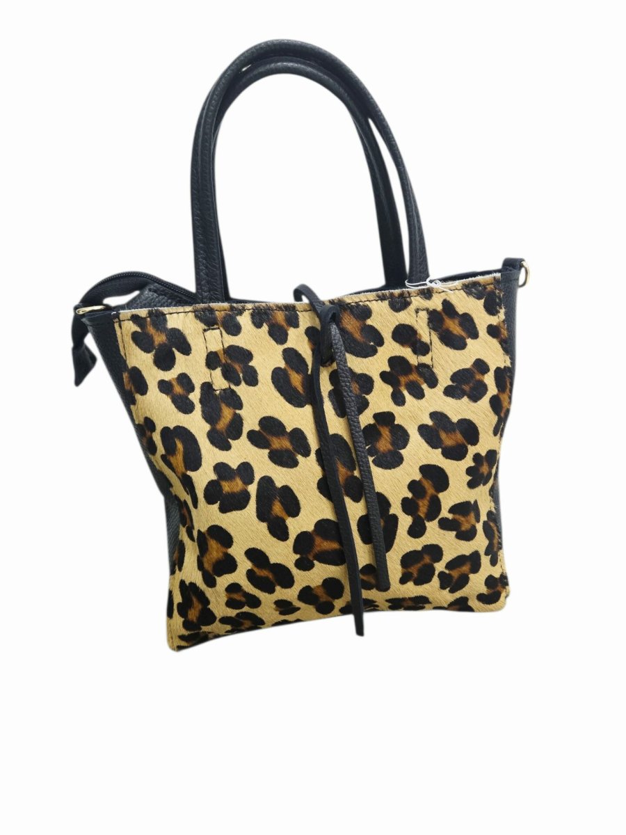 Borsa realizzata in vera pelle e cavallino maculato ,made Italy, chiusura con zip,interno nudo con borsellino estraibile e tracolla.Misure H24 B7 L28 - immagine 3