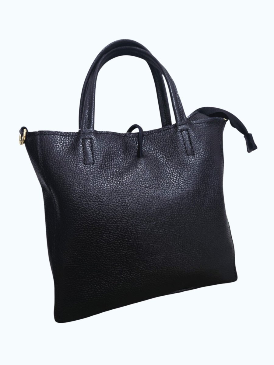 Borsa realizzata in vera pelle e cavallino maculato ,made Italy, chiusura con zip,interno nudo con borsellino estraibile e tracolla.Misure H24 B7 L28 - immagine 4
